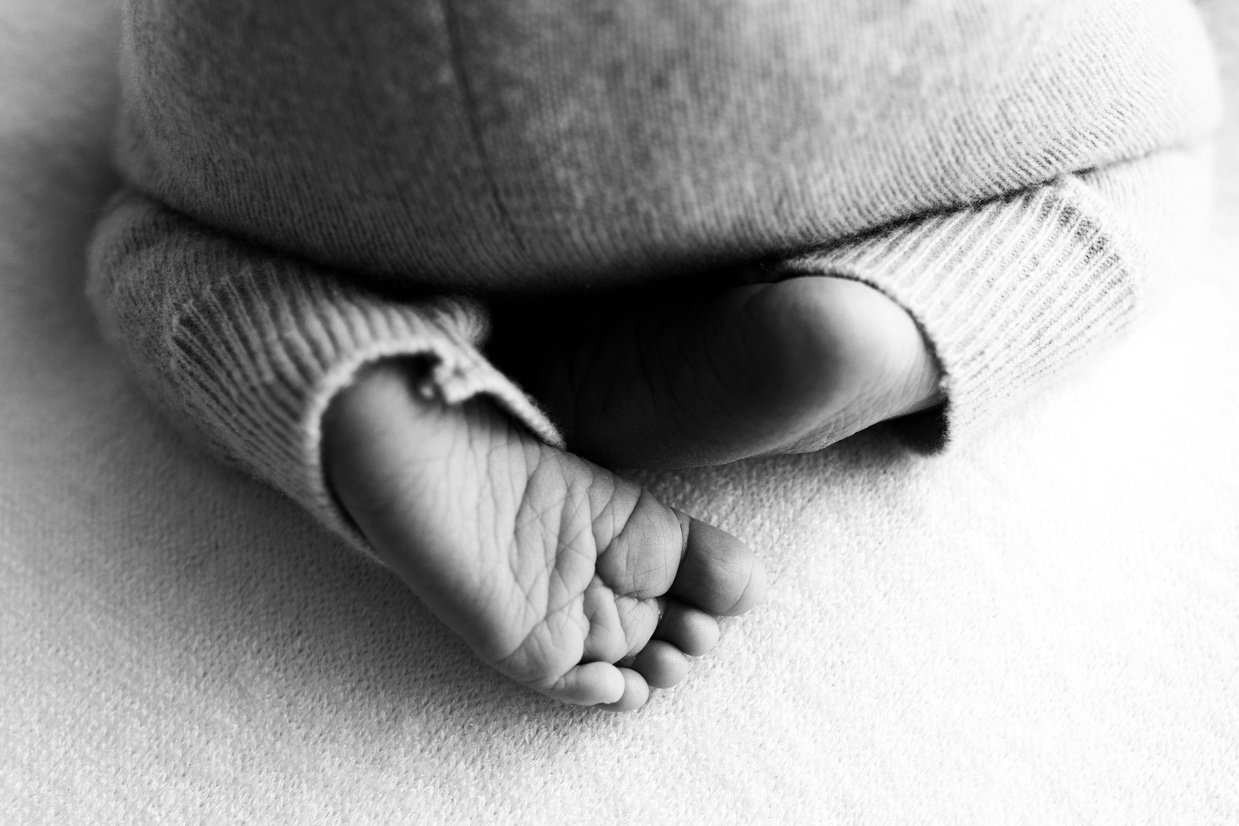  Black and White Image of Baby's Feet Soles